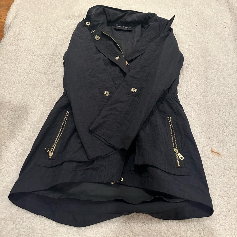 Black and gold rain jacket
